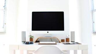 iMac on top of table
