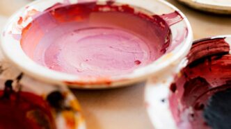 white and red ceramic bowl