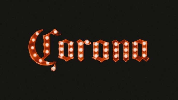 orange and white love me neon light signage