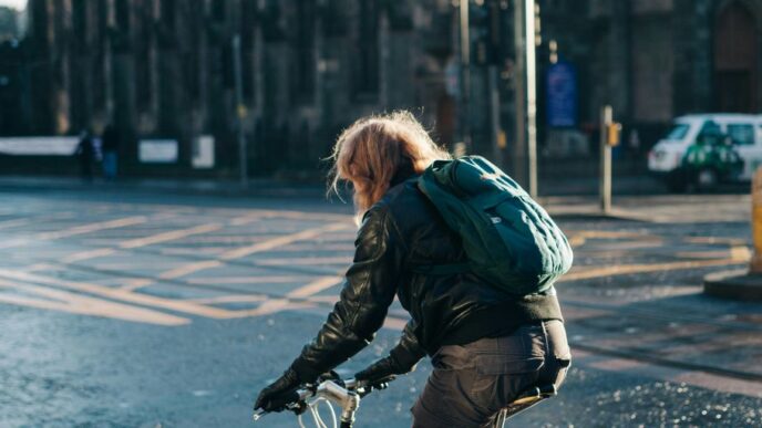 man riding on bicycle