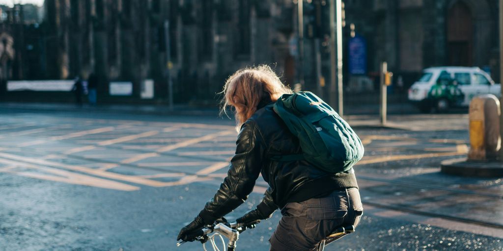 man riding on bicycle