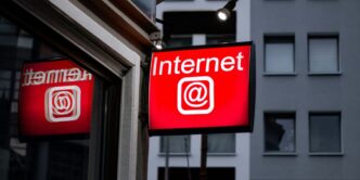 Internet LED signage beside building near buildings