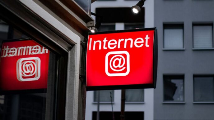 Internet LED signage beside building near buildings