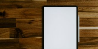 white rectangular frame on brown wooden table