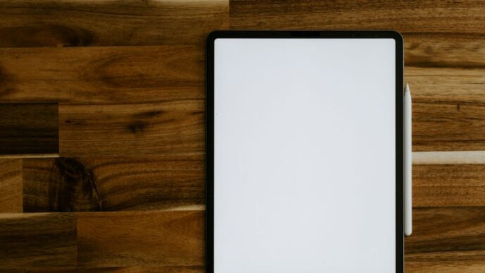 white rectangular frame on brown wooden table