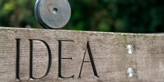 love wooden signage on brown wooden fence