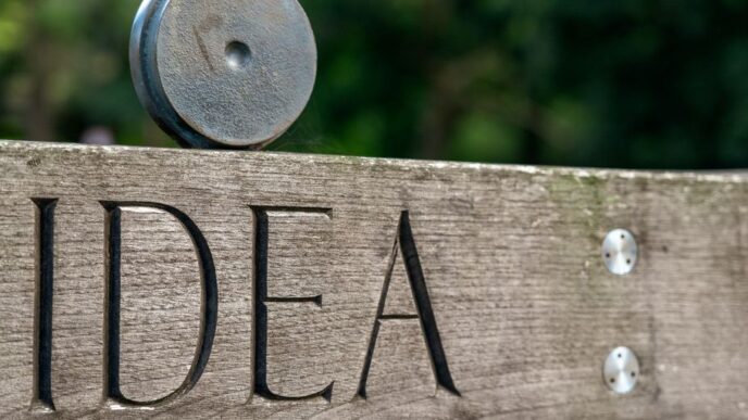 love wooden signage on brown wooden fence