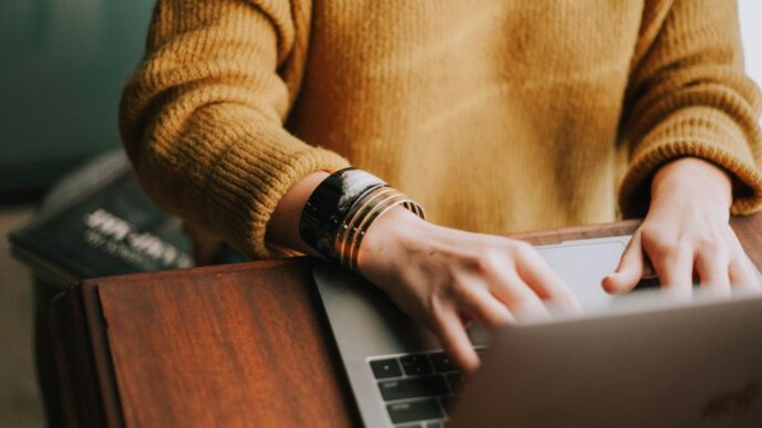 person using laptop computer