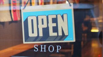 gray and blue Open signage