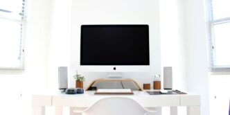 iMac on top of table
