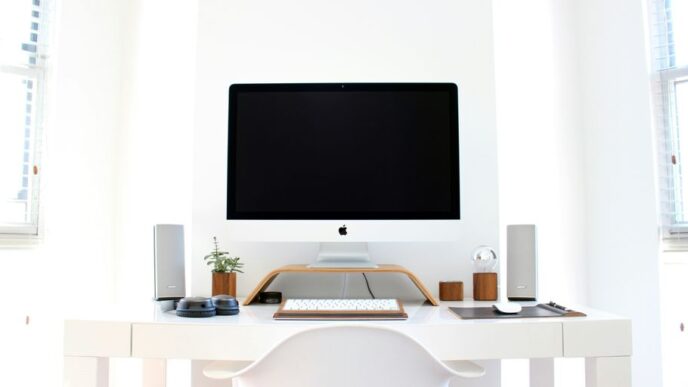 iMac on top of table