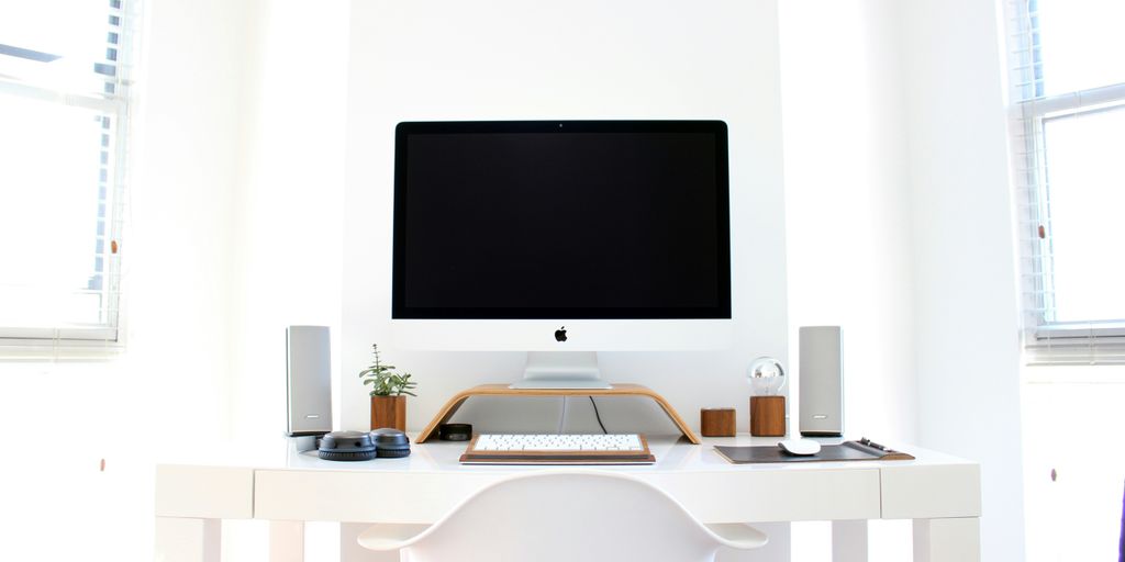 iMac on top of table