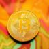 Golden Bitcoin coin shining brightly, symbolizing market optimism.
