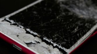 white iphone 5 c on black surface