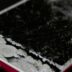 white iphone 5 c on black surface