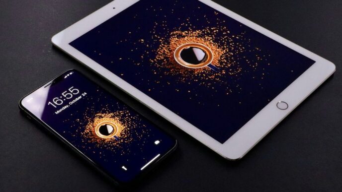gold Apple iPad and black smartphone
