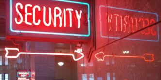 a red security sign and a blue security sign