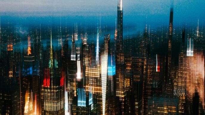 Blurred cityscape with bright lights at night.