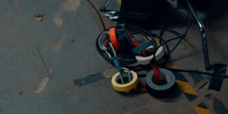 black red and yellow corded headphones