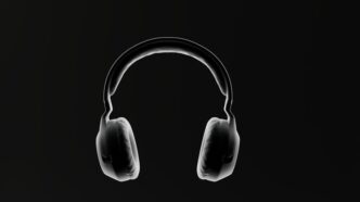 a pair of headphones on a black background