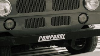 a black and white photo of the front of a truck