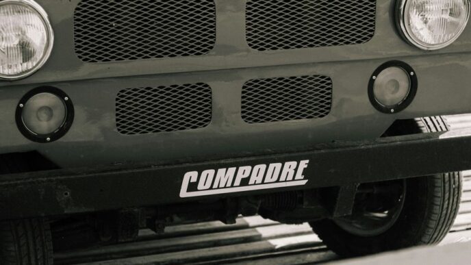 a black and white photo of the front of a truck