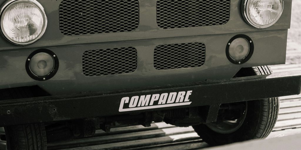 a black and white photo of the front of a truck