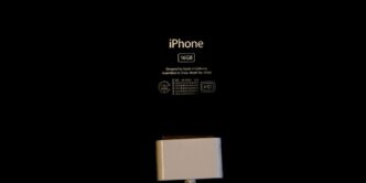 an iphone is plugged in to a charger
