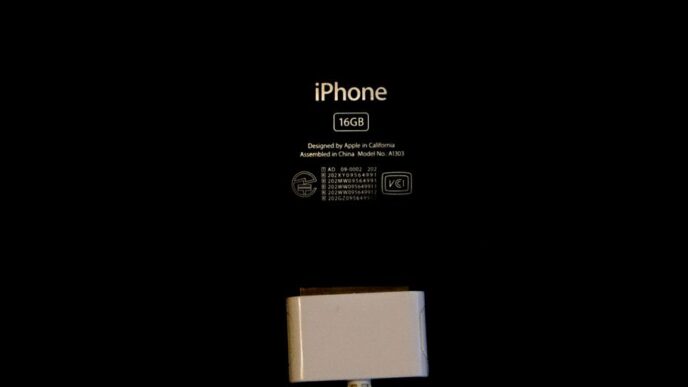 an iphone is plugged in to a charger