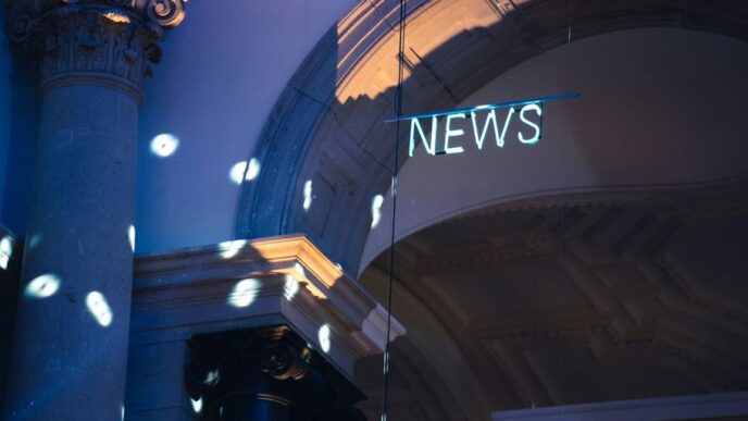 a building with a sign on the roof