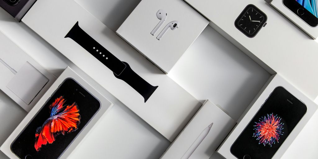 silver iphone 6 on white table