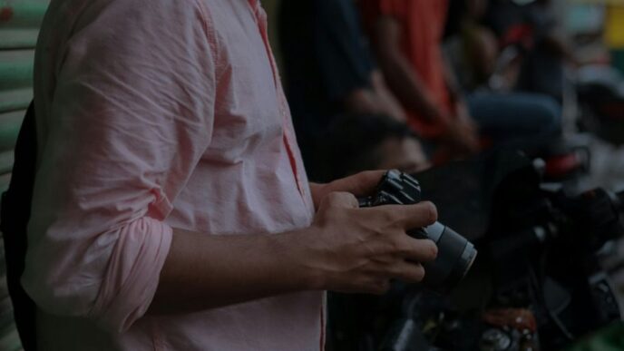 a man holding a watch