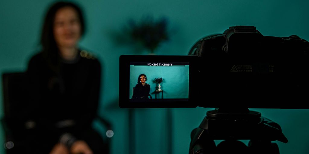 Filming a video with the camera in focus.