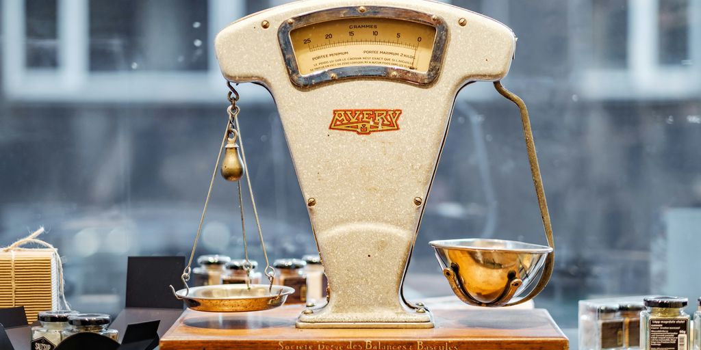 brown and beige weighing scale