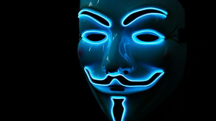 a person wearing a blue mask with a black background