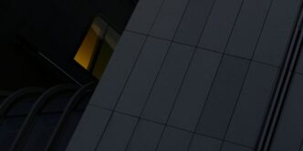 a tall building with a clock on the side of it