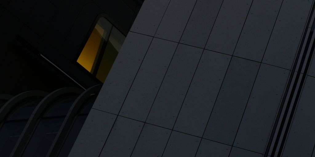 a tall building with a clock on the side of it