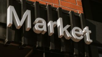 a sign on the side of a building that says market