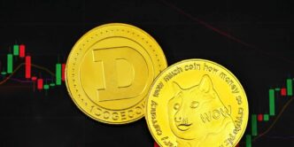 a close up of two gold coins near a stock chart