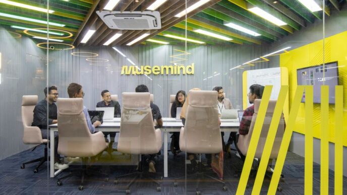 a group of people sitting around a table
