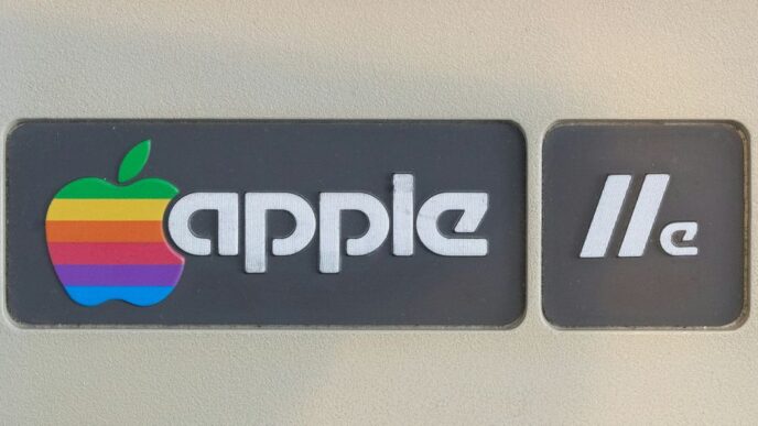 a close up of a sign with an apple logo