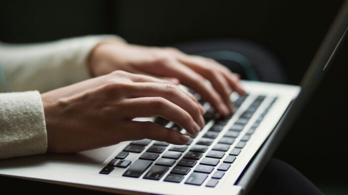 person using laptop