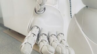 closeup photo of white robot arm