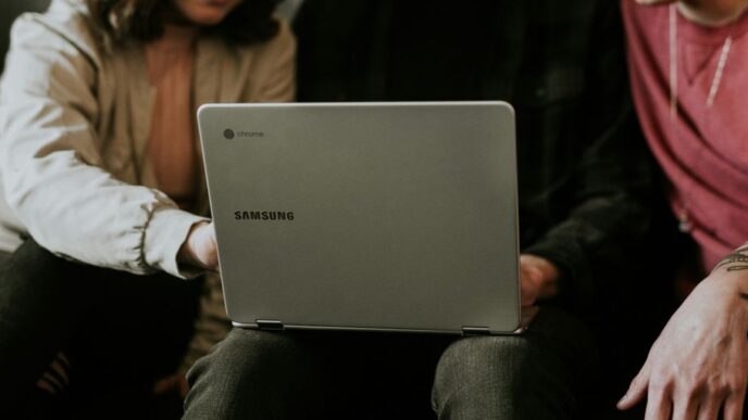 person using laptop