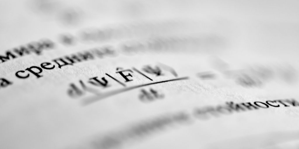 a close up of a piece of paper with writing on it