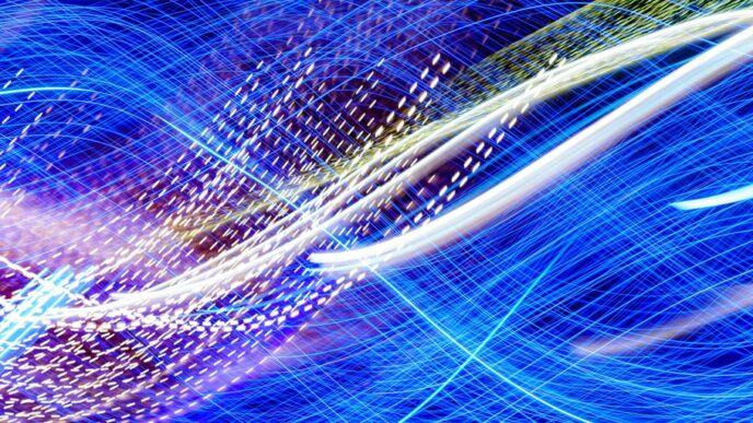 a blurry image of blue and white lights