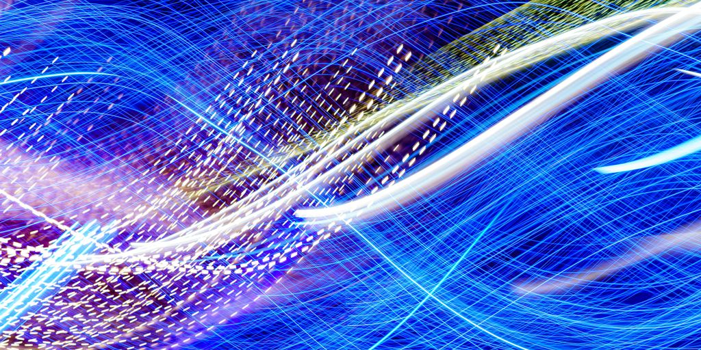 a blurry image of blue and white lights