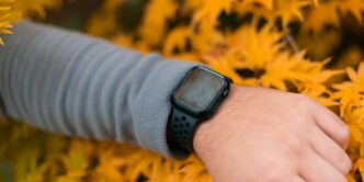 person wearing black smart watch