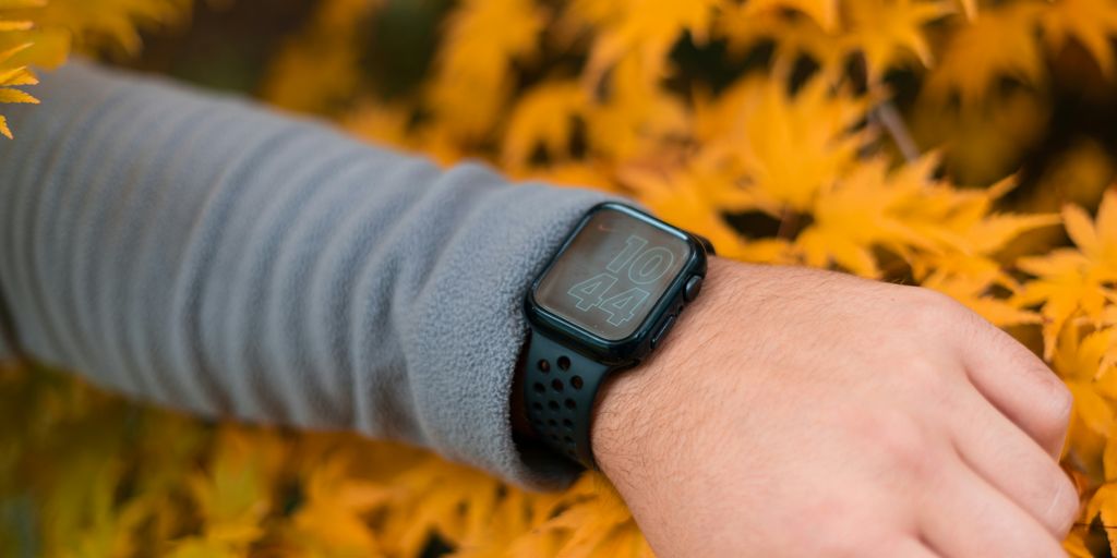 person wearing black smart watch