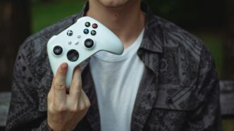 a person holding a video game controller